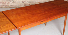 Load image into Gallery viewer, Danish Mid Century extending teak dining table, circa 1970s
