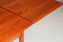 Load image into Gallery viewer, Danish Mid Century extending teak dining table, circa 1970s
