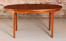 Load image into Gallery viewer, Mid Century oval extending teak dining table by McIntosh, circa 1960s
