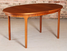 Load image into Gallery viewer, Mid Century oval extending teak dining table by McIntosh, circa 1960s
