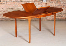 Load image into Gallery viewer, Mid Century oval extending teak dining table by McIntosh, circa 1960s
