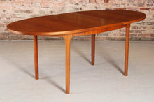 Load image into Gallery viewer, Mid Century oval extending teak dining table by McIntosh, circa 1960s
