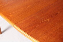 Load image into Gallery viewer, Mid Century oval extending teak dining table by McIntosh, circa 1960s

