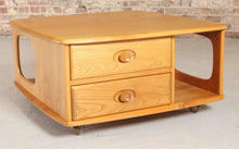 Load image into Gallery viewer, Mid Century Ercol Pandora's Box beech and elm occasional table on casters, circa 1970s

