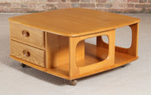 Load image into Gallery viewer, Mid Century Ercol Pandora's Box beech and elm occasional table on casters, circa 1970s
