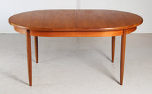 Load image into Gallery viewer, A mid century G Plan Fresco extending oval teak dining table, circa 1960s
