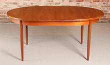 Load image into Gallery viewer, A mid century G Plan Fresco extending oval teak dining table, circa 1960s
