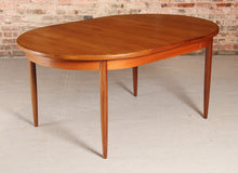 Load image into Gallery viewer, A mid century G Plan Fresco extending oval teak dining table, circa 1960s
