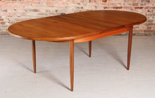 Load image into Gallery viewer, A mid century G Plan Fresco extending oval teak dining table, circa 1960s
