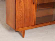 Load image into Gallery viewer, Mid Century glass fronted teak bookcase, circa 1960s
