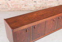 Load image into Gallery viewer, Mid Century Long Rosewood Sideboard with Carved Handles, circa 1960s.
