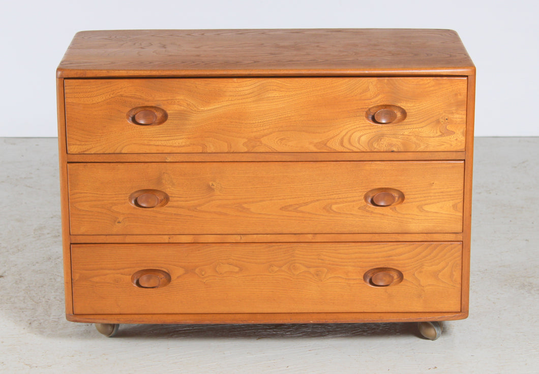 Mid Century Ercol Solid Elm Dressing Chest of Drawers on Casters, circa 1960s.