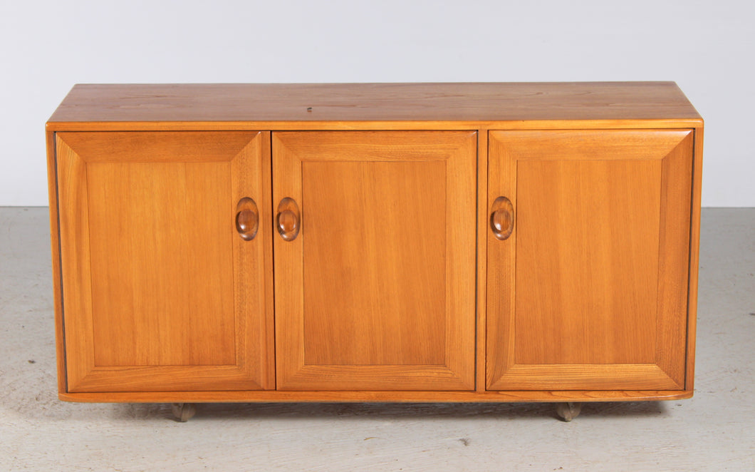 Mid Century Ercol Windsor Media Cabinet / Sideboard on Casters, circa 1970s.