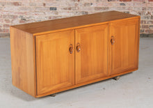 Load image into Gallery viewer, Mid Century Ercol Windsor Media Cabinet / Sideboard on Casters, circa 1970s.
