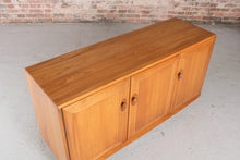 Load image into Gallery viewer, Mid Century Ercol Windsor Media Cabinet / Sideboard on Casters, circa 1970s.
