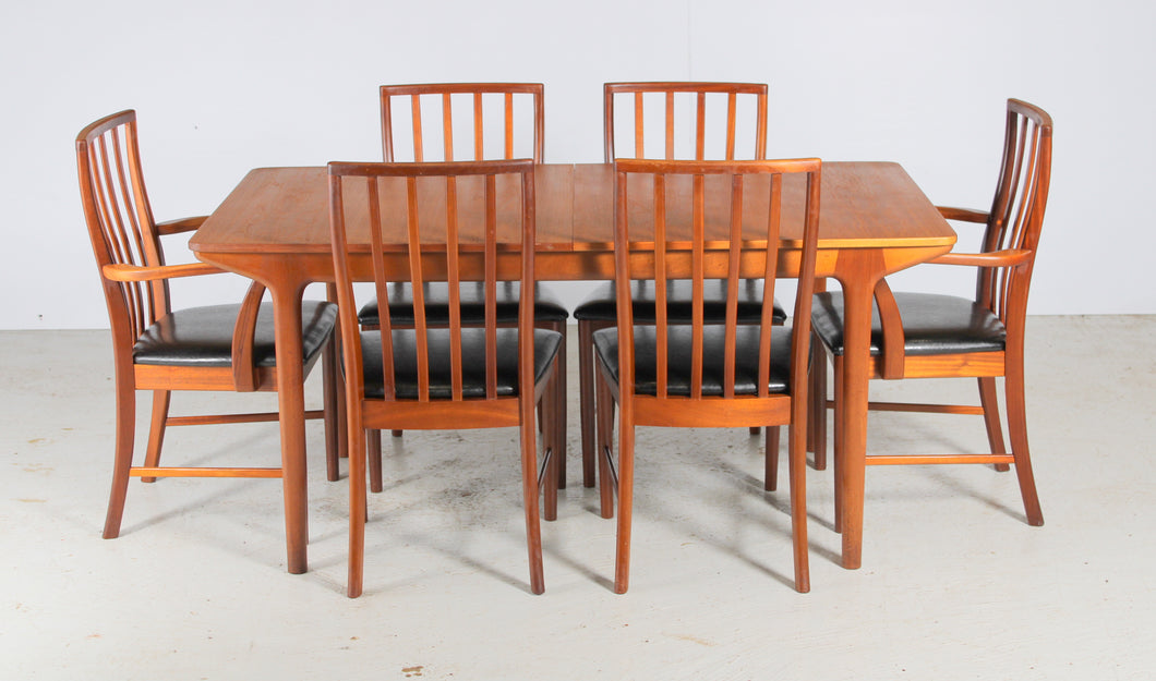 A Midcentury Teak Extending Dining Table and Six Chairs by McIntosh. c1960s