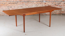 Load image into Gallery viewer, A Midcentury Teak Extending Dining Table and Six Chairs by McIntosh. c1960s
