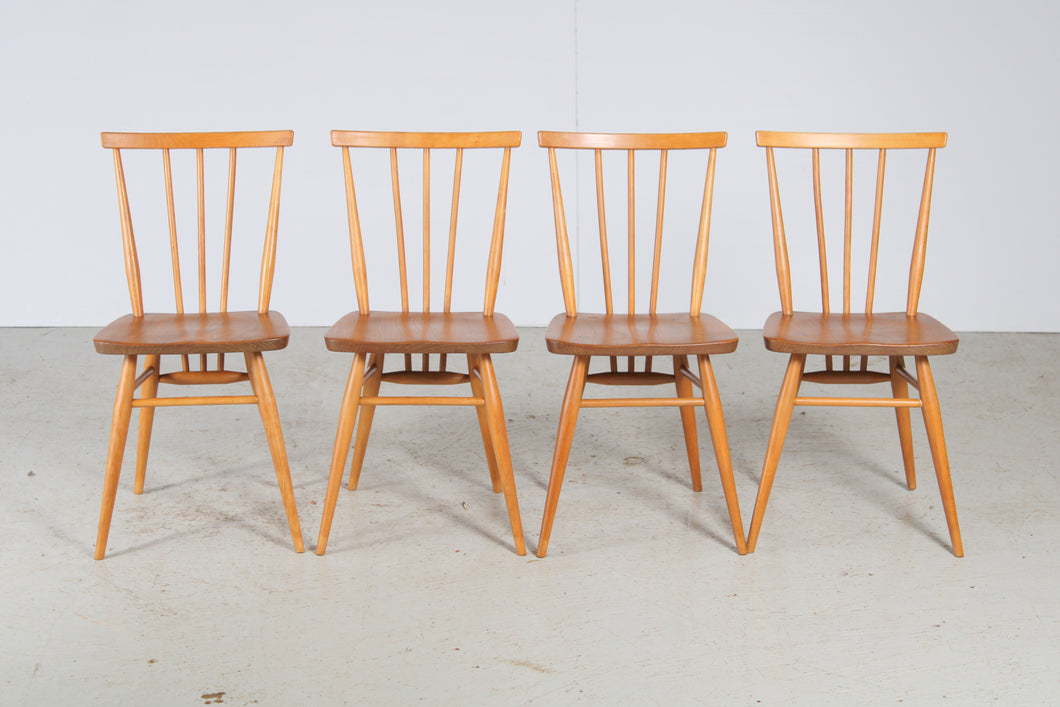 A Set of Four Ercol Model 391 Elm and Beech Chairs c. 1960s.