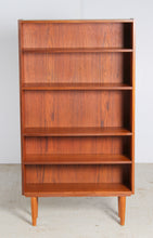 Load image into Gallery viewer, Mid Century teak bookcase on tapered legs, circa 1960s
