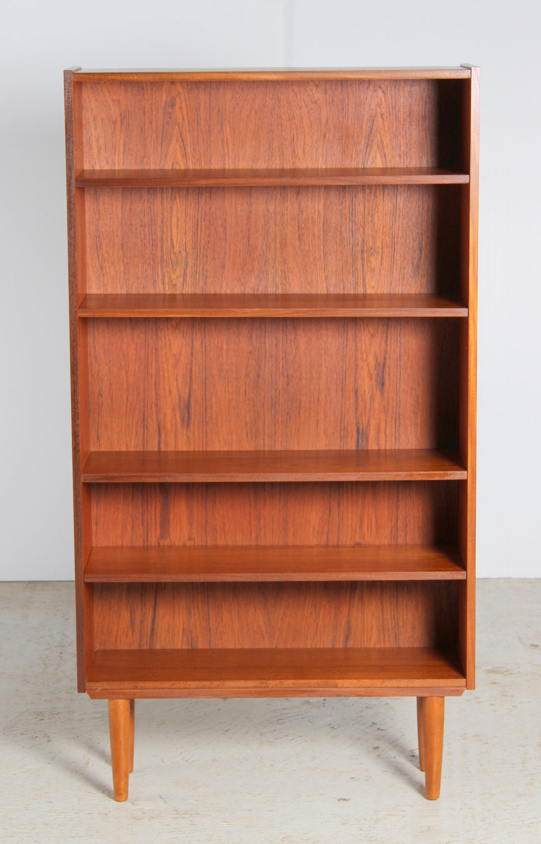 Mid Century teak bookcase on tapered legs, circa 1960s