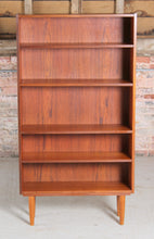 Load image into Gallery viewer, Mid Century teak bookcase on tapered legs, circa 1960s
