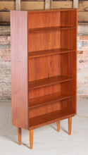 Load image into Gallery viewer, Mid Century teak bookcase on tapered legs, circa 1960s
