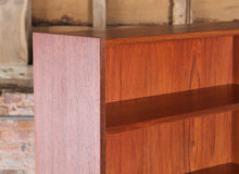 Load image into Gallery viewer, Mid Century teak bookcase on tapered legs, circa 1960s
