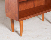 Load image into Gallery viewer, Mid Century teak bookcase on tapered legs, circa 1960s
