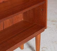 Load image into Gallery viewer, Mid Century teak bookcase on tapered legs, circa 1960s
