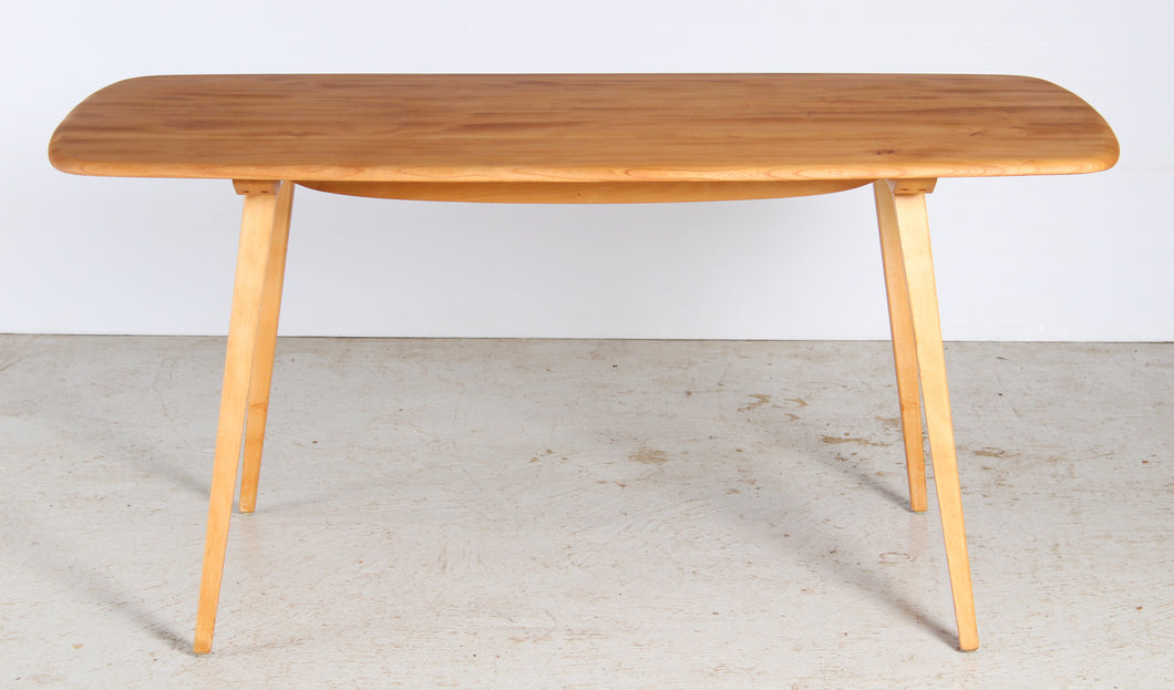 Mid Century Ercol Model 382 Plank Dining Table, circa 1960s.