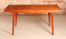 Load image into Gallery viewer, Danish Mid Century extending teak dining table by Arne Hovmand Olsen for Mogens Kold, circa 1960s
