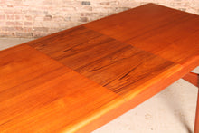 Load image into Gallery viewer, Danish Mid Century extending teak dining table by Arne Hovmand Olsen for Mogens Kold, circa 1960s
