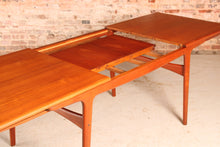 Load image into Gallery viewer, Danish Mid Century extending teak dining table by Arne Hovmand Olsen for Mogens Kold, circa 1960s
