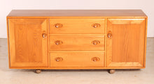 Load image into Gallery viewer, Mid Century Ercol Model 455 Elm Sideboard on Casters, circa 1970s.
