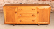 Load image into Gallery viewer, Mid Century Ercol Model 455 Elm Sideboard on Casters, circa 1970s.
