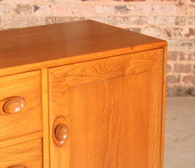 Load image into Gallery viewer, Mid Century Ercol Model 455 Elm Sideboard on Casters, circa 1970s.
