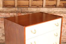 Load image into Gallery viewer, Mid Century G-plan Librenza tola and black chest of drawers with original Chinese White drawer fronts, circa 1960s.
