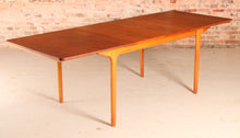 Load image into Gallery viewer, Mid Century extending teak dining table by McIntosh, circa 1960s
