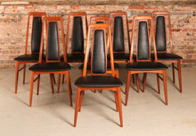 Load image into Gallery viewer, A set of 8 Danish teak ‘Eva’ dining chairs by Niels Koefoed, c. 1970s.
