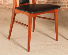 Load image into Gallery viewer, A set of 8 Danish teak ‘Eva’ dining chairs by Niels Koefoed, c. 1970s.
