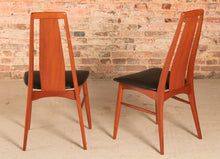 Load image into Gallery viewer, A set of 8 Danish teak ‘Eva’ dining chairs by Niels Koefoed, c. 1970s.
