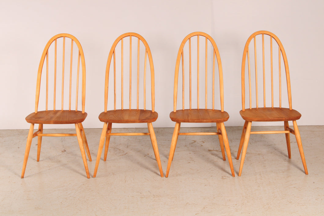 Set of 4 Mid Century blue label Ercol Quaker elm dining chairs, circa 1960s.