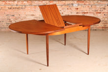 Load image into Gallery viewer, A mid century G Plan Fresco extending oval teak dining table, circa 1960s
