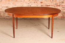 Load image into Gallery viewer, A mid century G Plan Fresco extending oval teak dining table, circa 1960s
