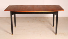 Load image into Gallery viewer, Mid Century extending rosewood dining table by Robin Day, circa 1960s.
