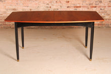 Load image into Gallery viewer, Mid Century extending rosewood dining table by Robin Day, circa 1960s.
