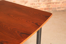 Load image into Gallery viewer, Mid Century extending rosewood dining table by Robin Day, circa 1960s.
