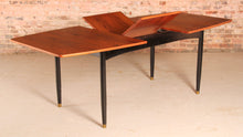 Load image into Gallery viewer, Mid Century extending rosewood dining table by Robin Day, circa 1960s.
