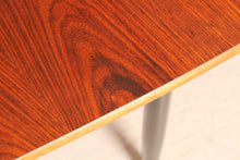 Load image into Gallery viewer, Mid Century extending rosewood dining table by Robin Day, circa 1960s.
