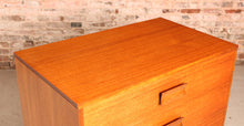 Load image into Gallery viewer, Mid Century teak chest of drawers with carved rosewood handles, circa 1960
